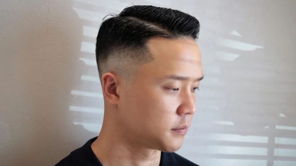 gaya rambut low taper fade, side part taper fade